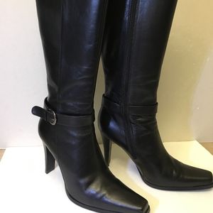 Just below the knee black leather boots